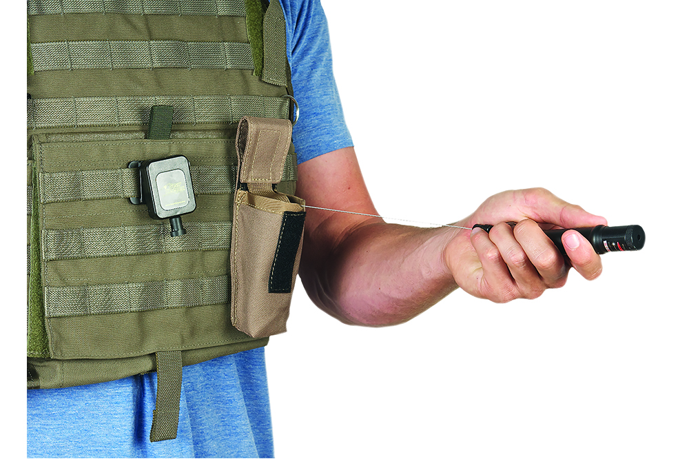 Holsters with Integrated Retractors Holsters with Integrated Retractors